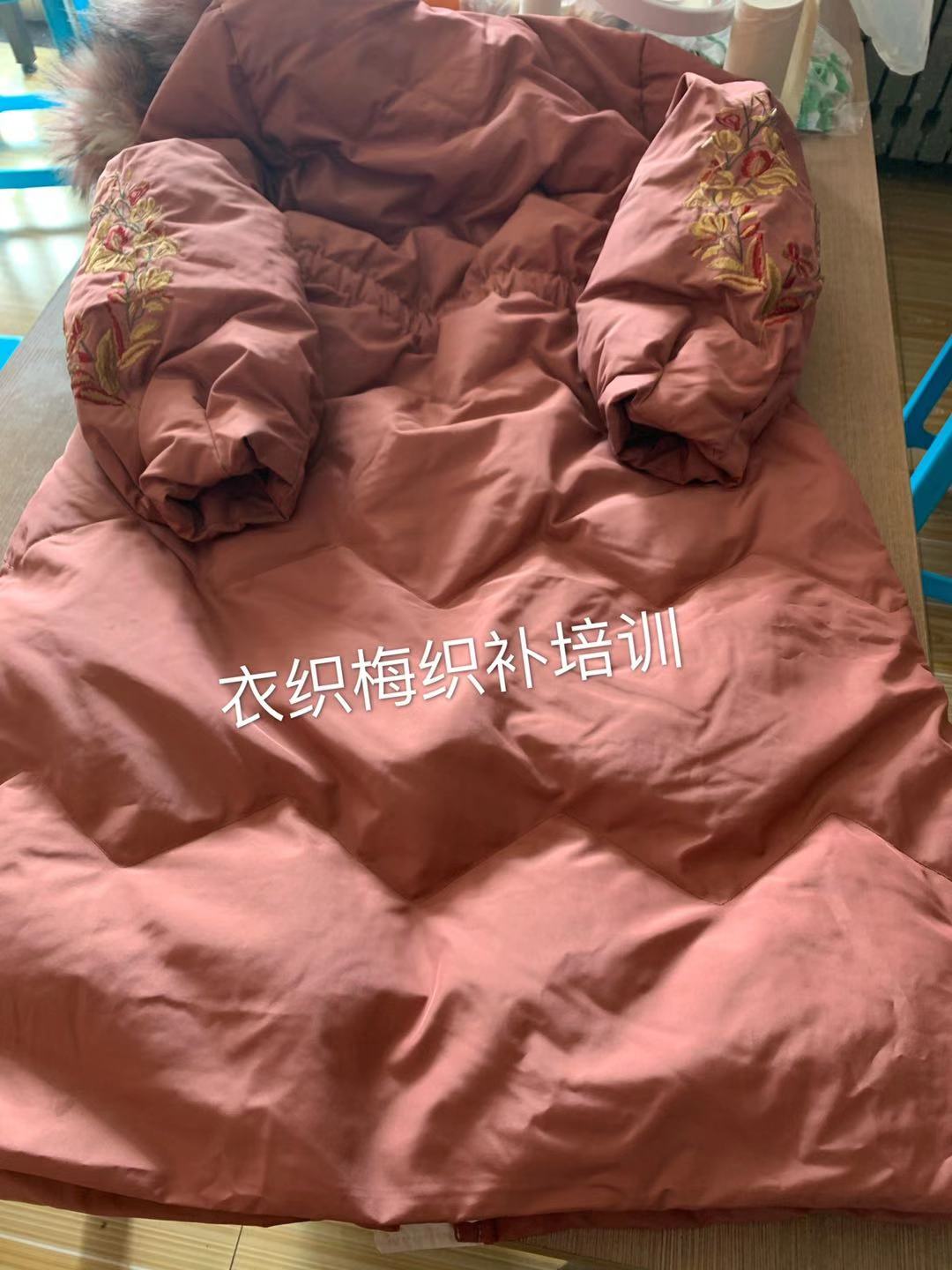 羽绒服修补后